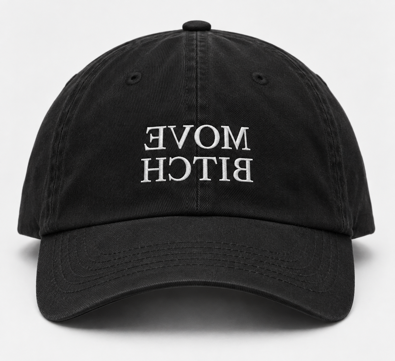 Black cap with white serif lettering mirrored to read MOVE BITCH in a reflection